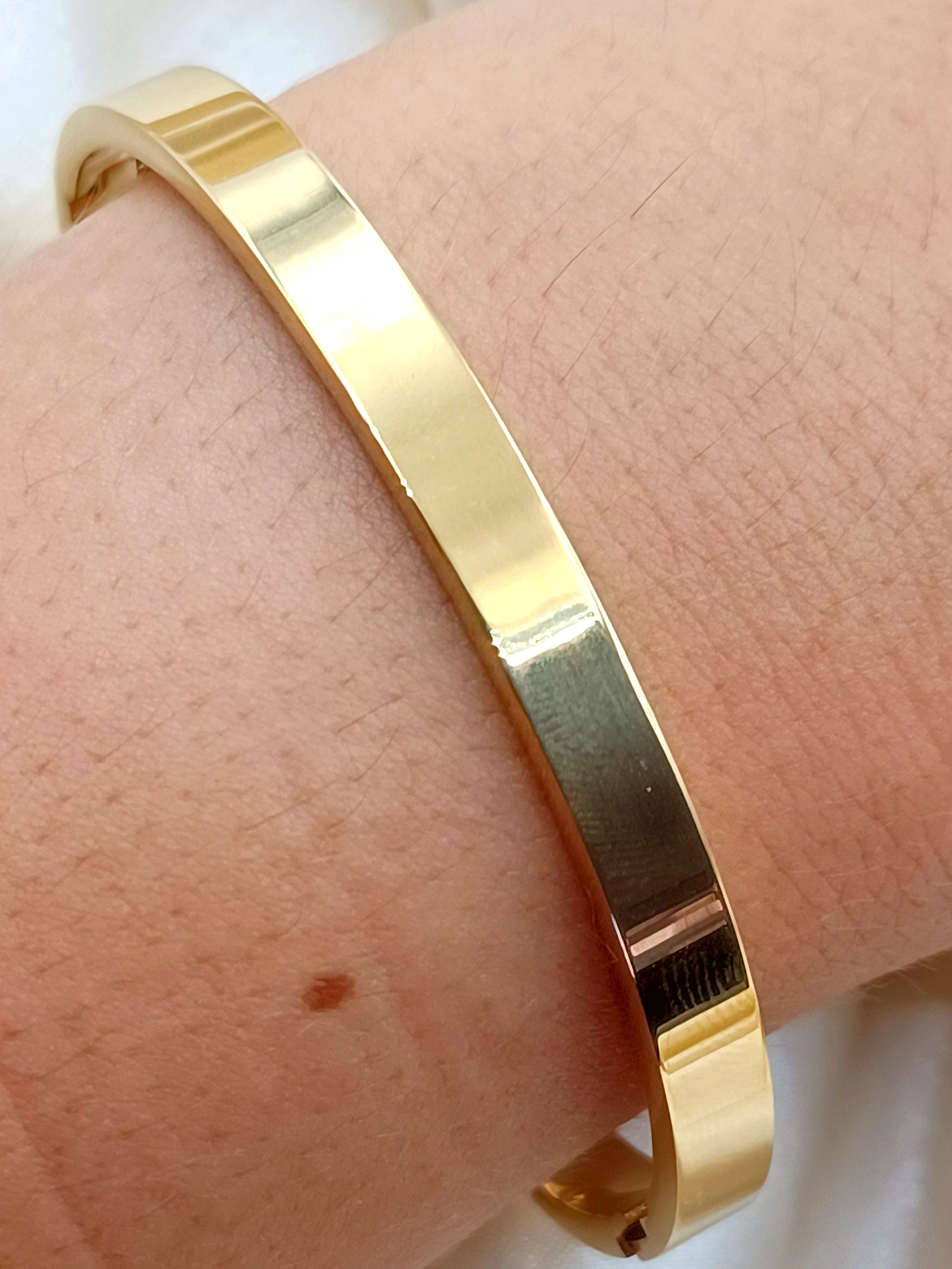 bracciale rigido in acciaio gold