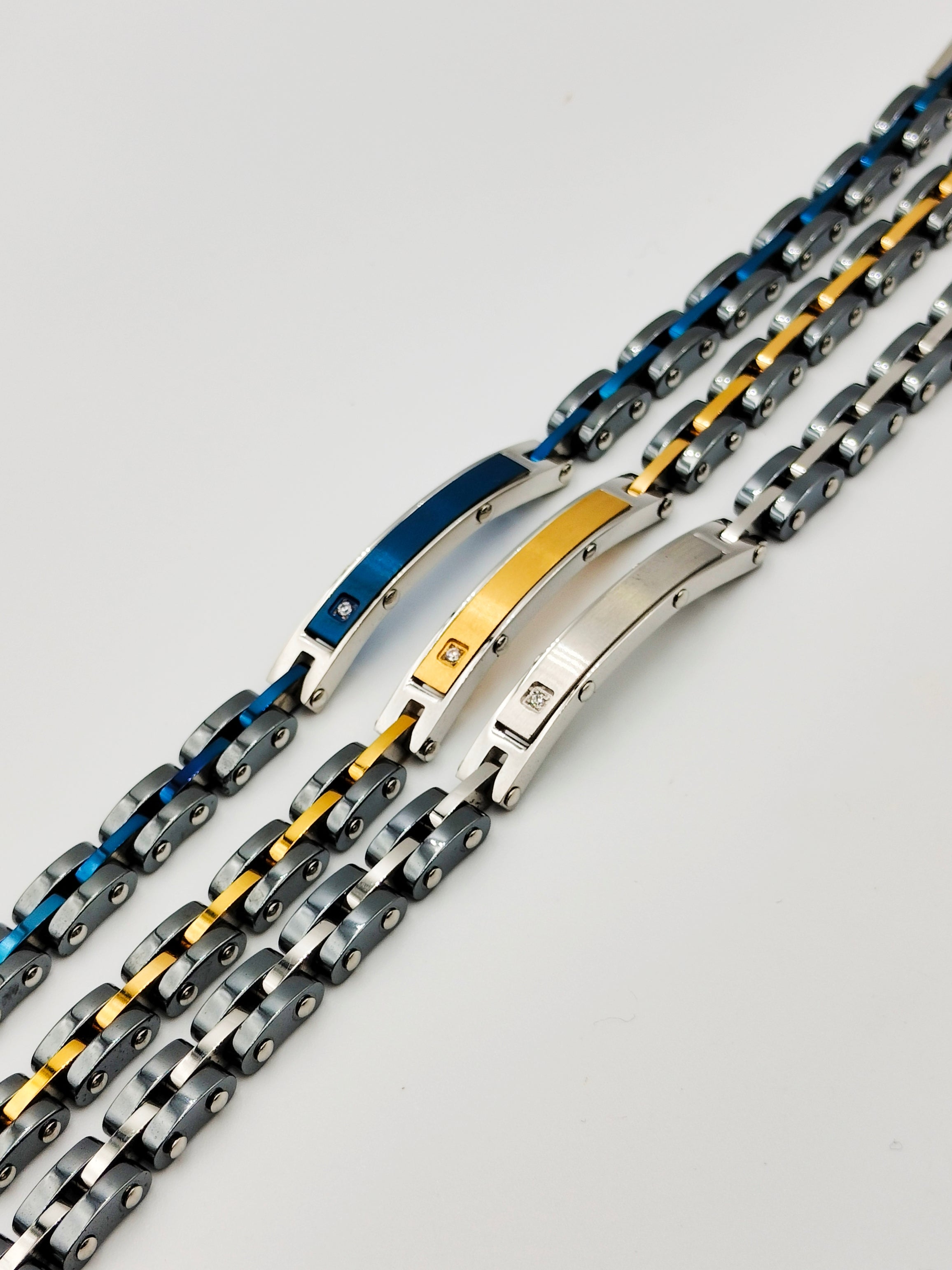 bracciali in acciaio e ceramica con piastrina