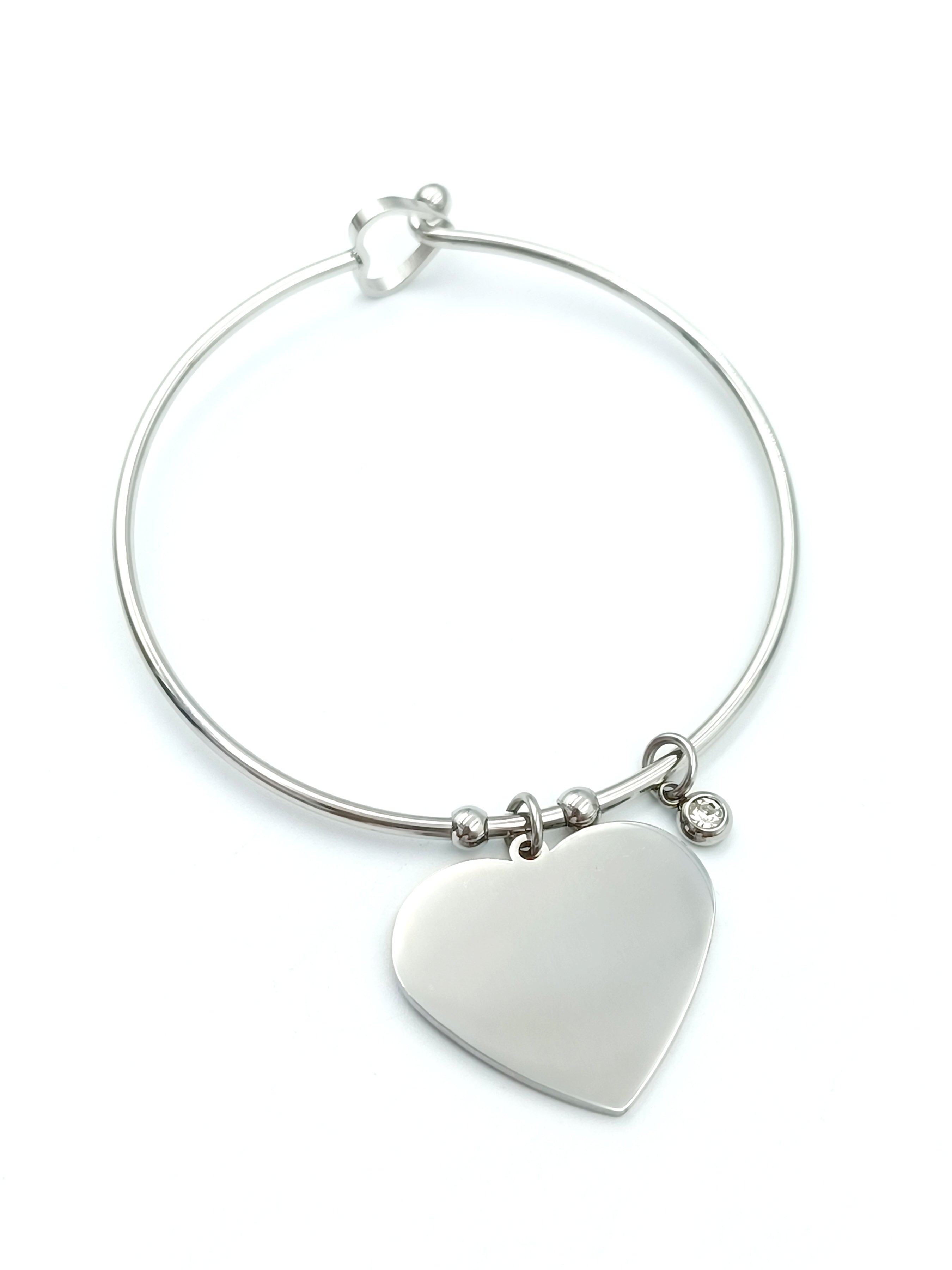 Bracciale rigido con cuore in acciaio