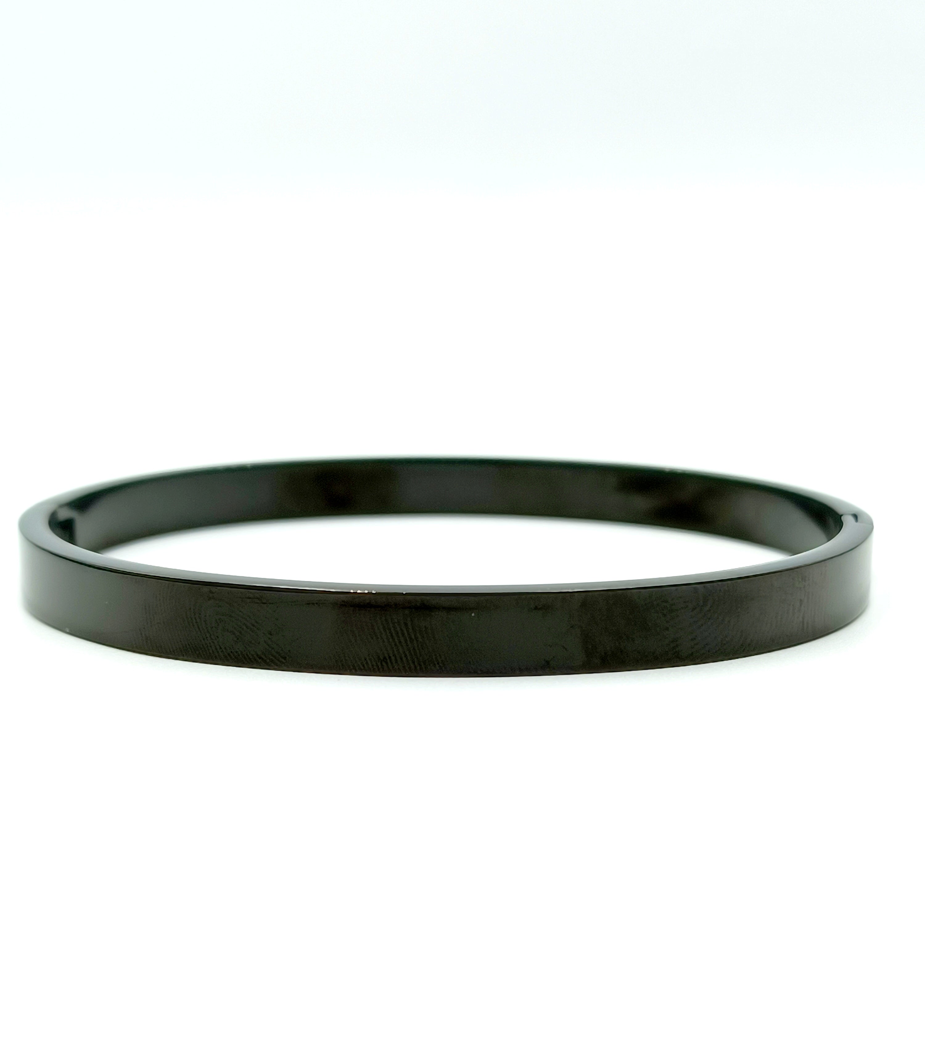 bracciale rigido in acciaio nero liscio