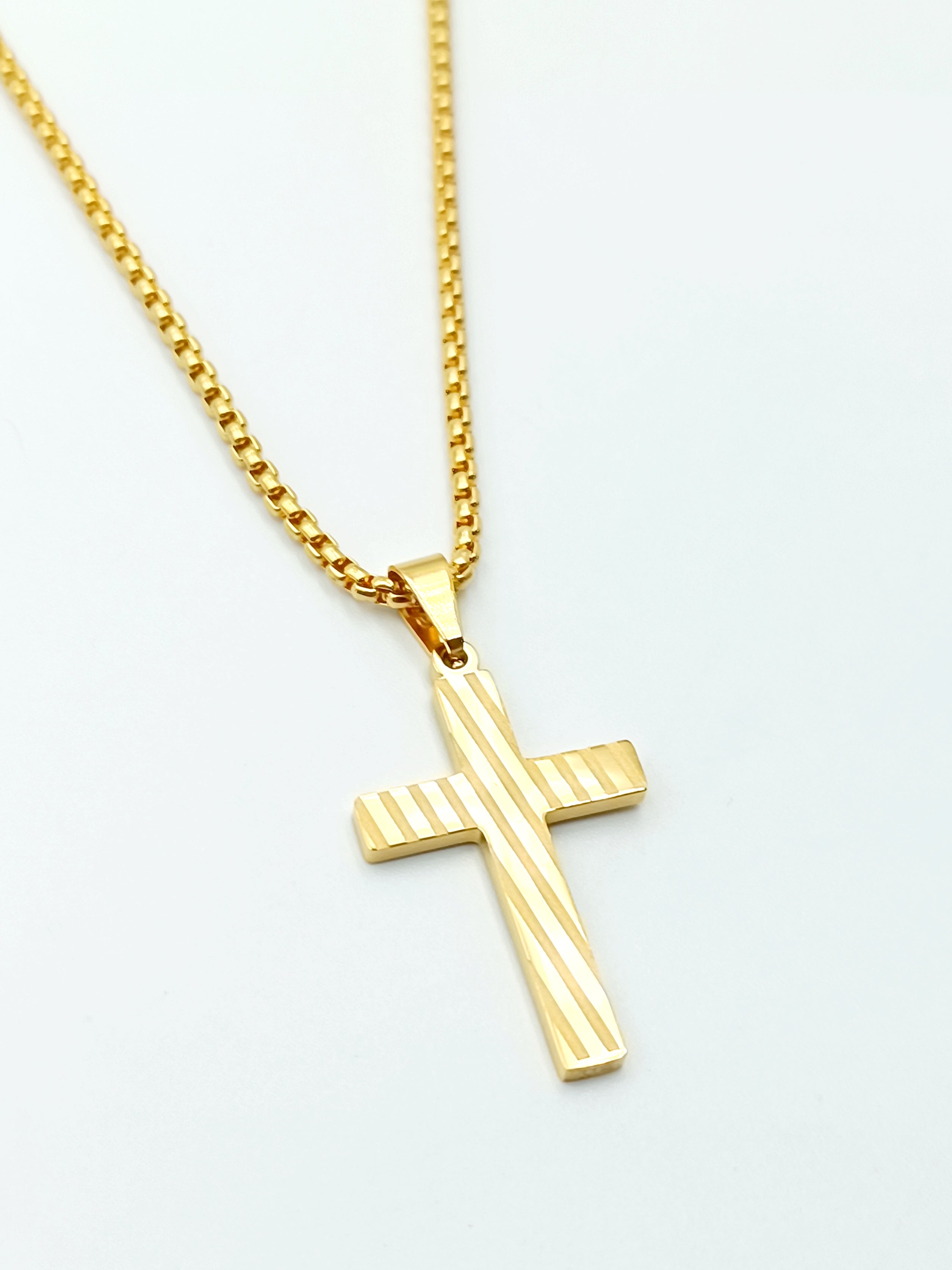 collana croce con strisce in acciaio gold