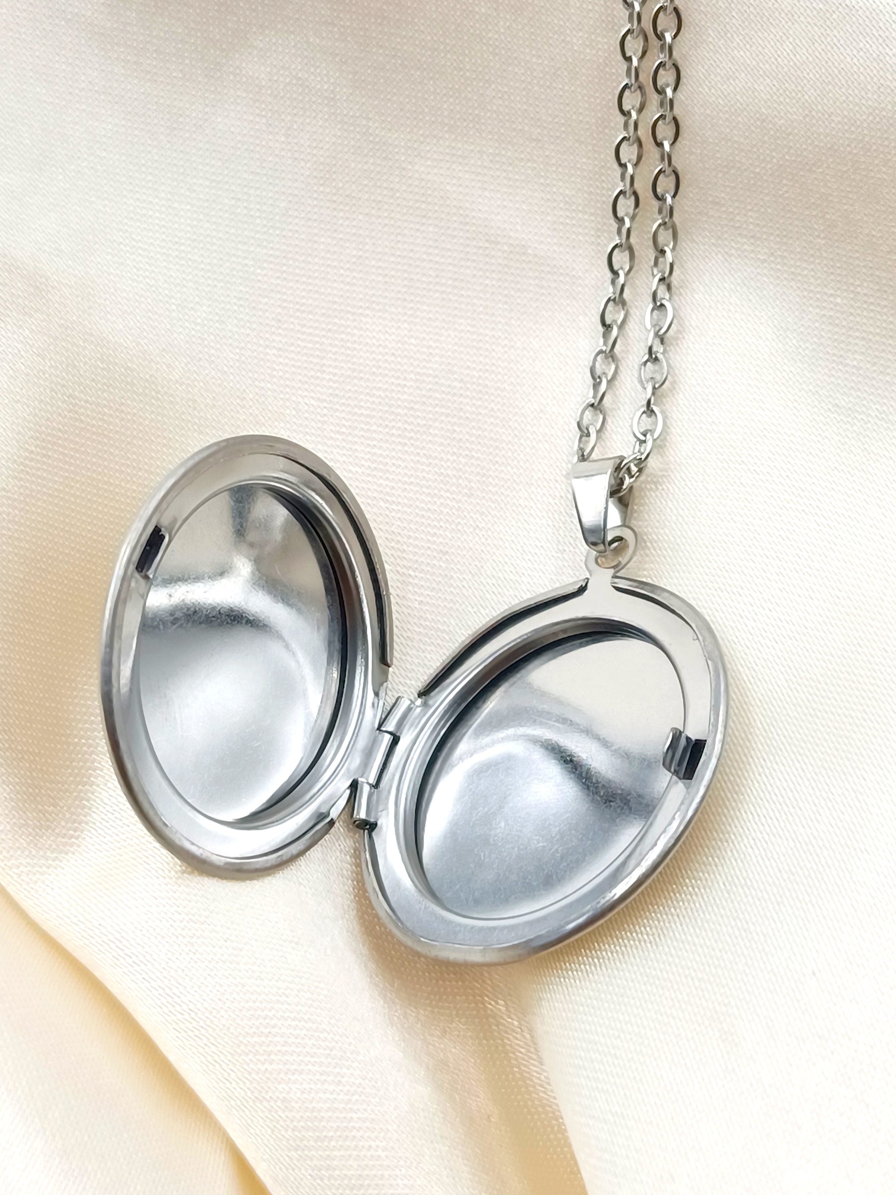 Collana portafoto rotondo in acciaio