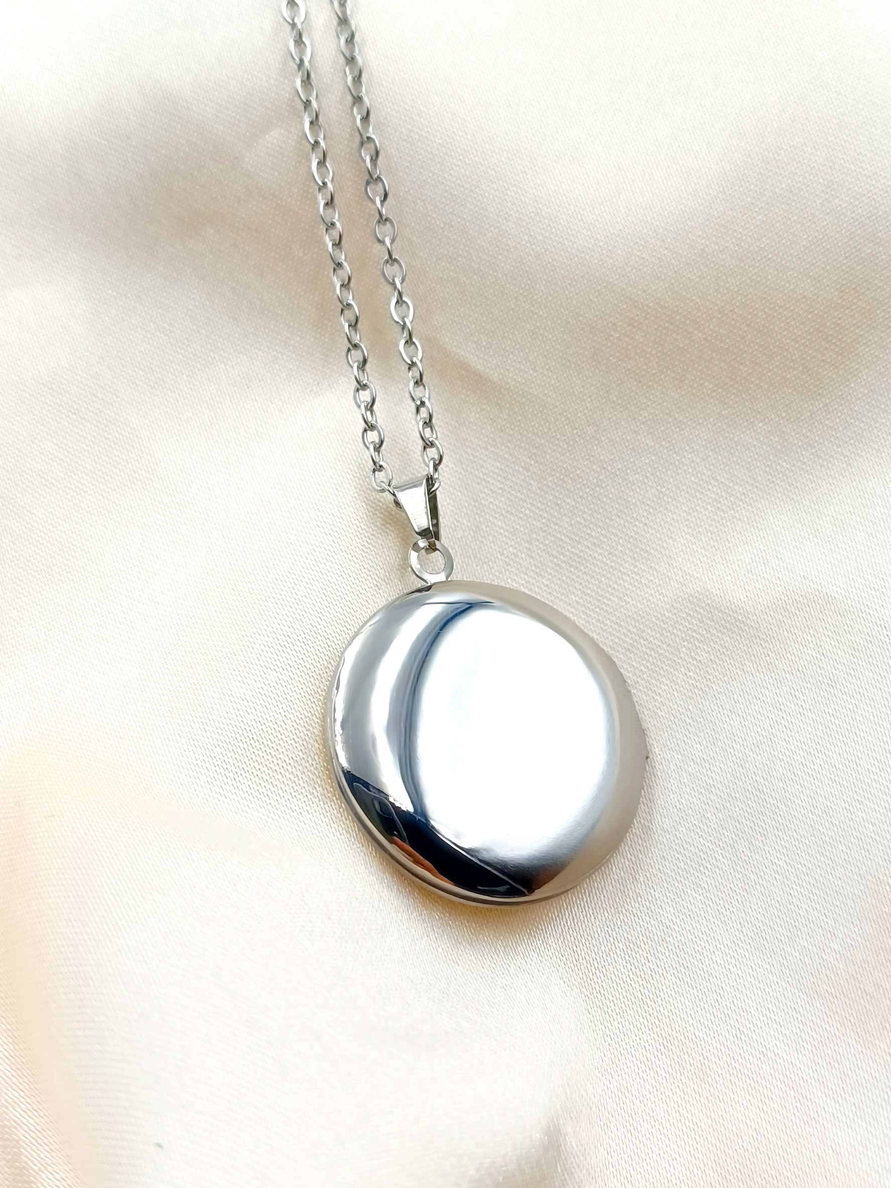 Collana portafoto rotondo in acciaio