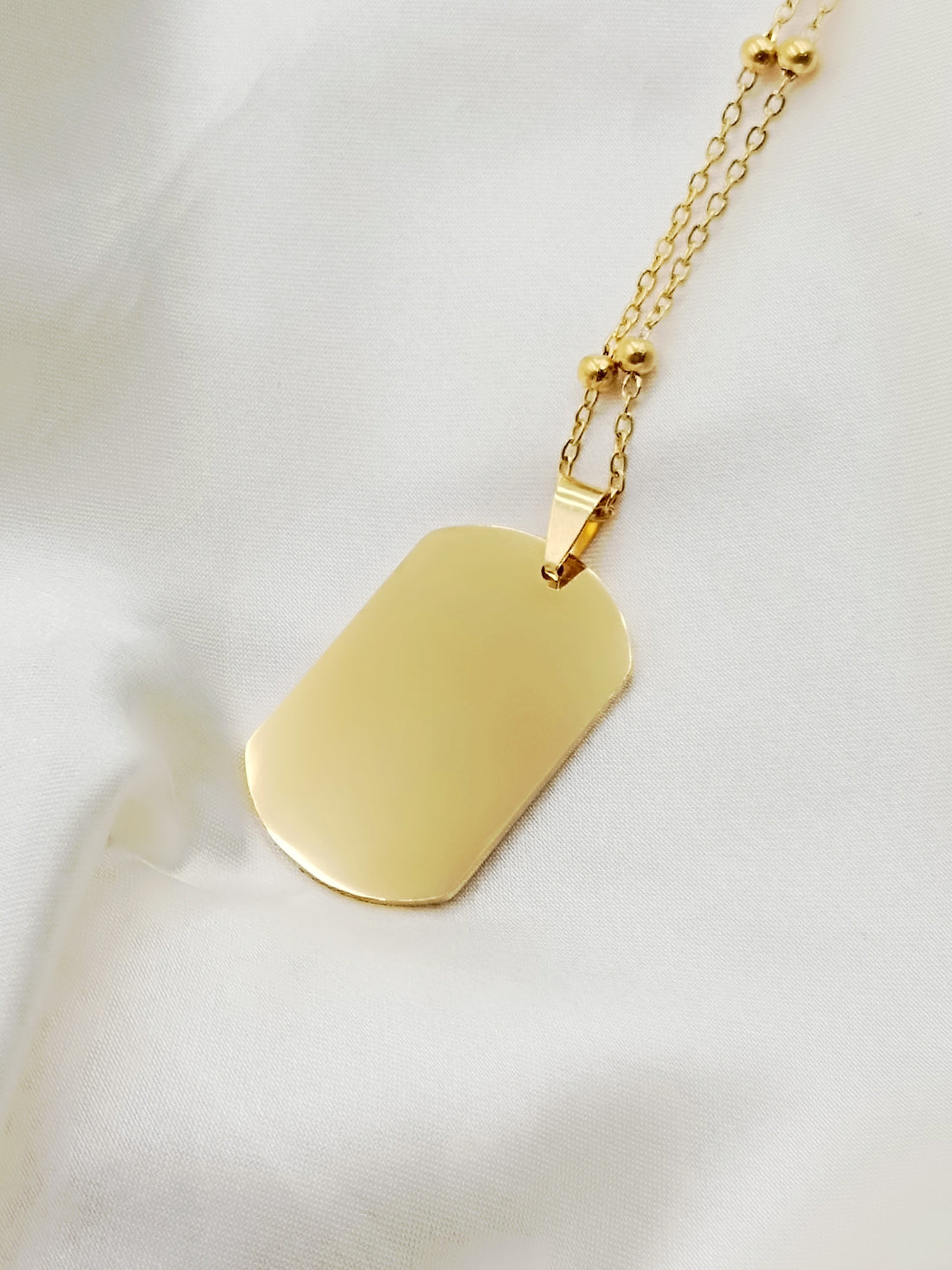 Collana con piastrina media gold