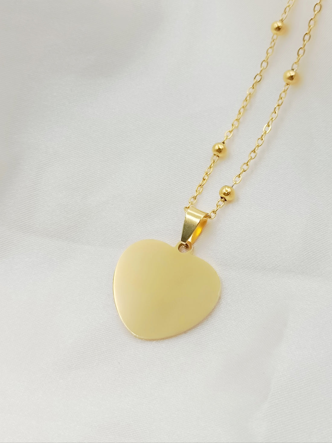 Collana con cuore rotondo medio gold