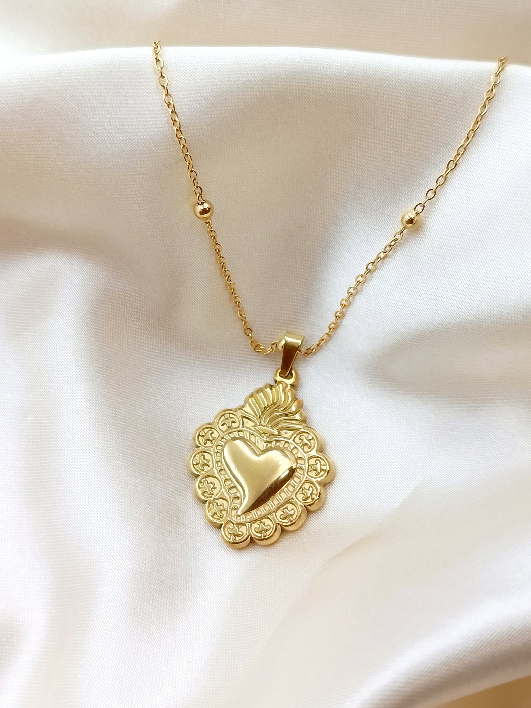 Collana sacro cuore in acciaio gold