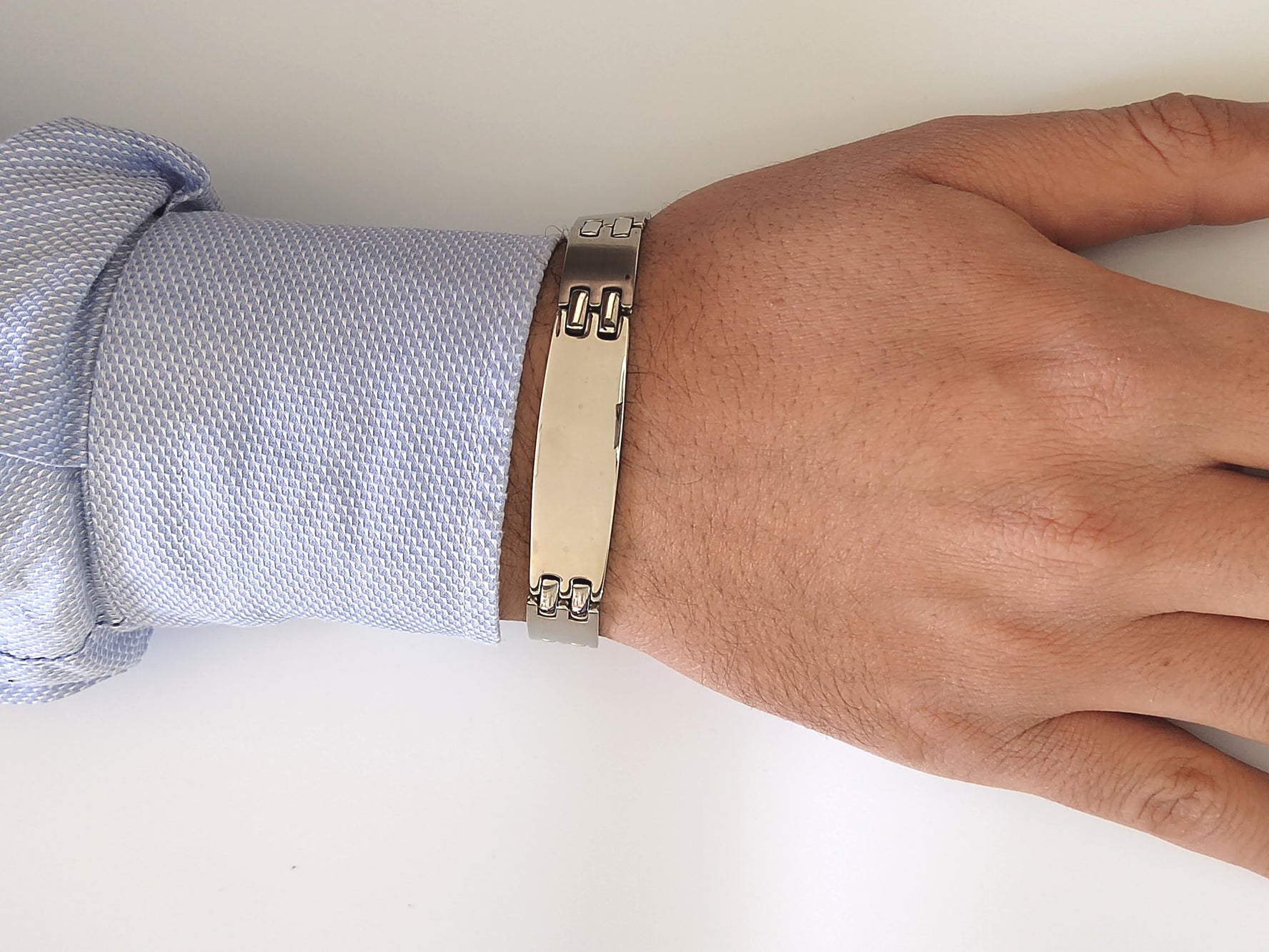 bracciale in acciaio con piastrina